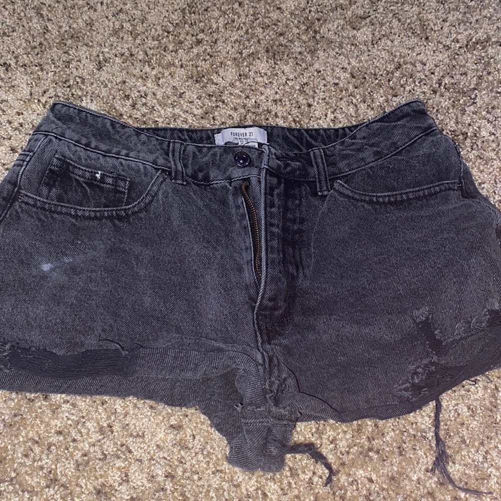 black ripped shorts